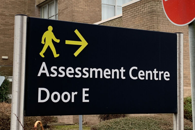 Sign: Assessment Centre, Door E