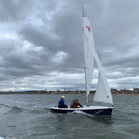 Two people sailing on the Forth